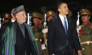 U.S. President Barack Obama with Afghanistan President Hamid Karzai in March (Charles Dharapak/AP)